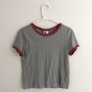 Black and white stripped t shirt with red accents